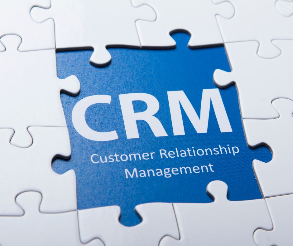 Puzzle with the word CRM in the middle in blue